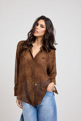 ACQUISTA IL TOTAL LOOK: Camicia in chiffon crop a manica morbida, Camicia con bottoni e Denim balloon azzurro