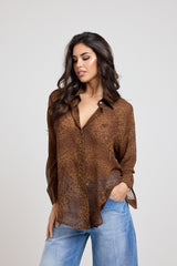 ACQUISTA IL TOTAL LOOK: Giacca in pelle, camicia in chiffon e denim balloon