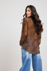 ACQUISTA IL TOTAL LOOK: Giacca in pelle, camicia in chiffon e denim balloon