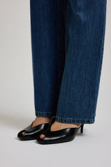 ACQUISTA IL TOTAL LOOK: Blazer nero in cadi, body in pizzo, gonna in tulle e sabot.