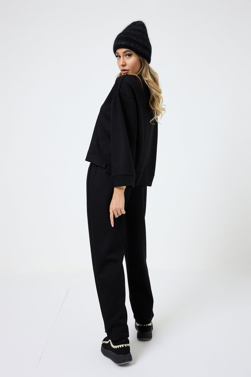 Completo tuta nera in punto Milano FEDERICA BI